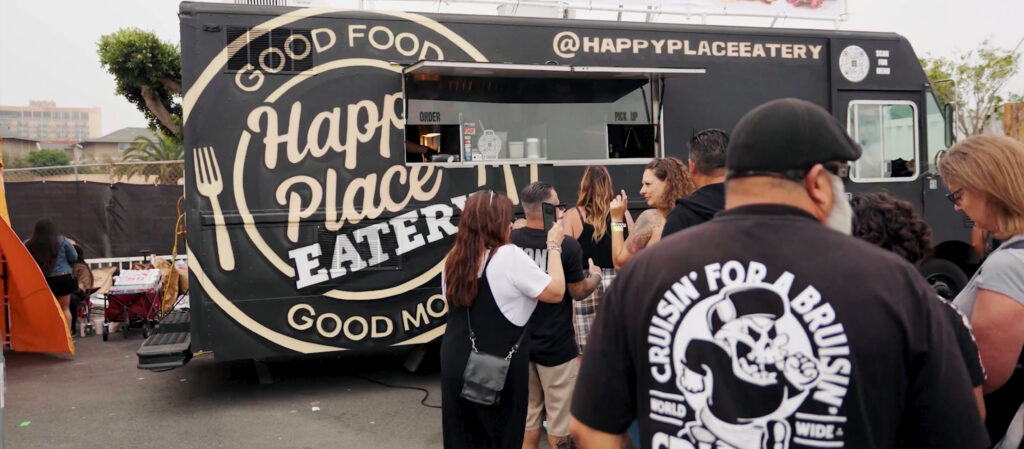 Customers lined up at the Happy Place Eatery food truck in Ventura