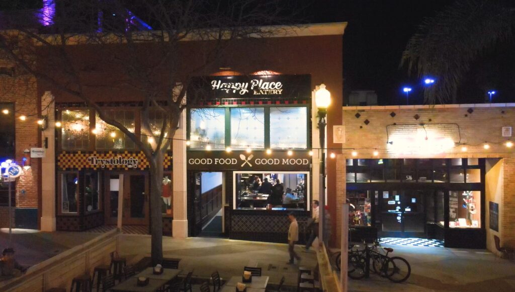 Happy Place Eatery storefront on East Main Street in Downtown Ventura at night